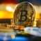 Bitcoin standing on motherboard